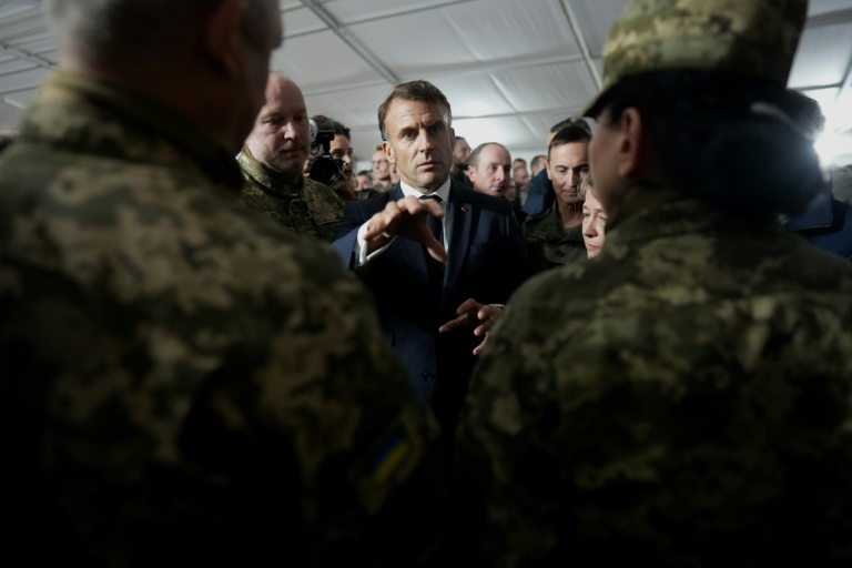 https://d.ibtimes.com/en/full/4573348/french-president-emmanuel-macron-speaks-ukrainian-soldiers-during-visit-military-camp-eastern.jpg