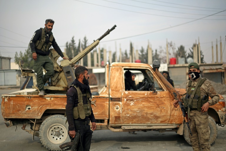 https://d.ibtimes.com/en/full/4574056/fighters-affiliated-turkish-backed-syrian-national-army-faction-patrol-manbij-region-syrias.jpg