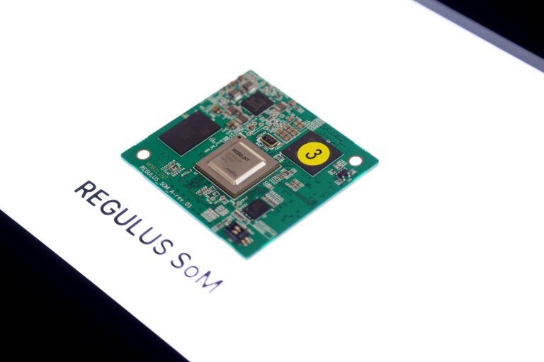 https://d.ibtimes.com/en/full/4574912/regulus-som-chip-ai-accelerator-sits-display-during-consumer-electronics-show-ces-las.jpg