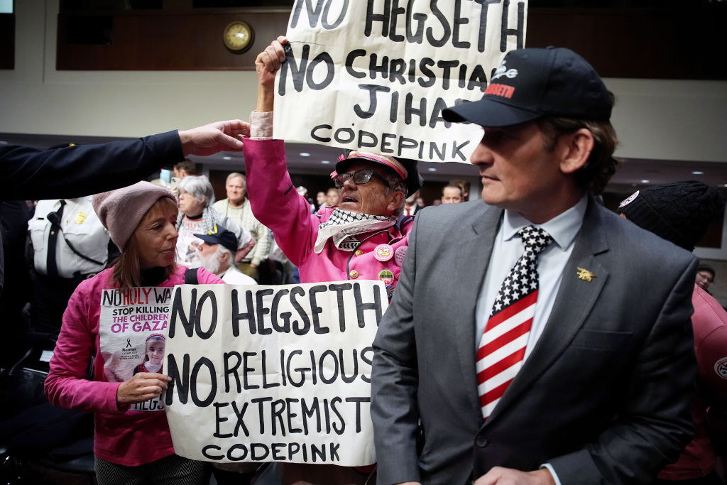 https://d.ibtimes.com/en/full/4575189/protests-pet-hegseth-hearing.jpg