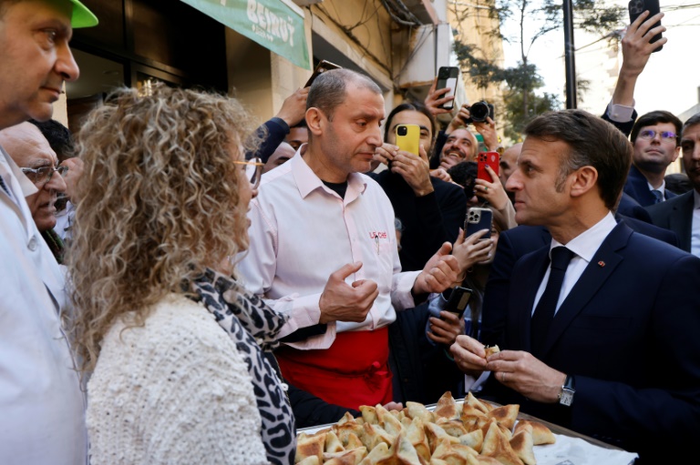 https://d.ibtimes.com/en/full/4576154/macron-strolled-along-lively-beirut-neighbourhood-gemmayzeh-few-blocs-back-coastal-citys-port.jpg