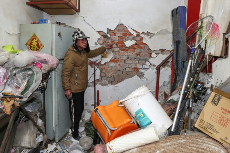 https://d.ibtimes.com/en/full/4576928/resident-tainan-shows-damage-his-home-after-60-magnitude-earthquake-hit-taiwan.jpg