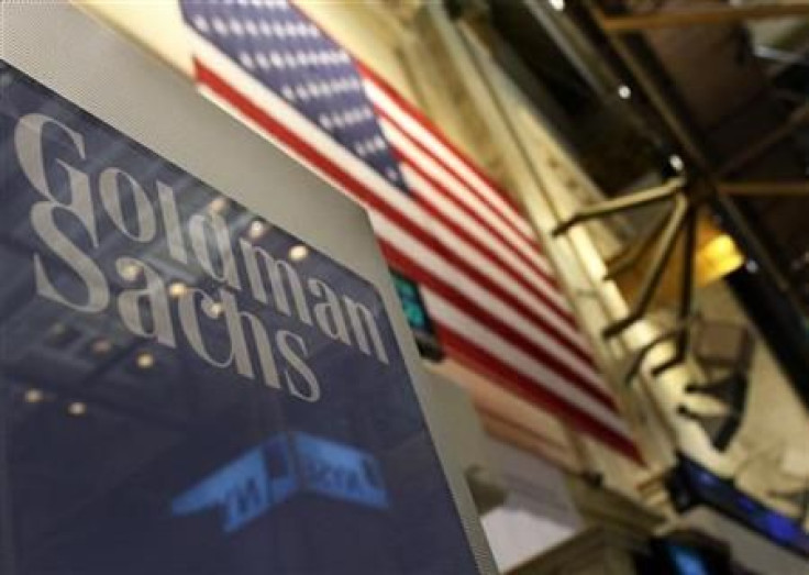 A Goldman Sachs sign is seen above their booth on the floor of the New York Stock Exchange