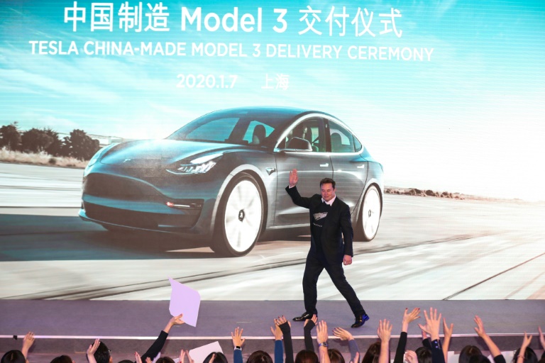 https://d.ibtimes.com/en/full/4578633/elon-musks-tesla-tesla-produces-its-famous-model-3-shanghai-factory-exports-it-europe.jpg