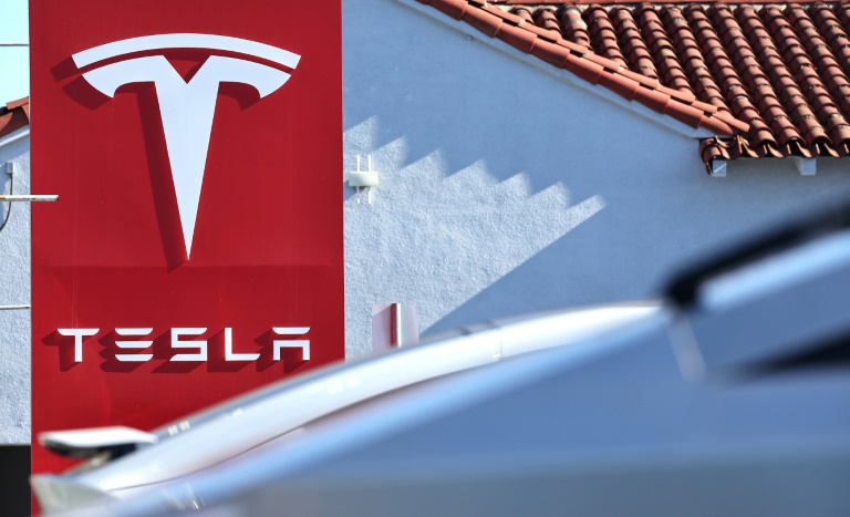 https://d.ibtimes.com/en/full/4579190/tesla-projected-return-volume-growth-2025-after-production-fell-2024.jpg