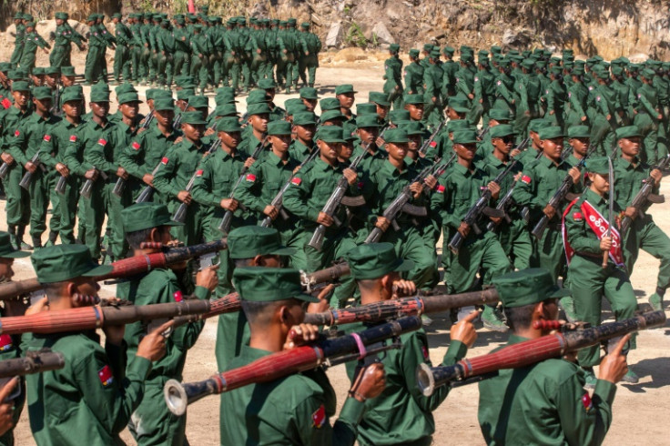 Members of the Mandalay People's Defense Forces rebel group marching in a graduation ceremony after training at a camp in an undisclosed location in Myanmar's northern Shan State in December