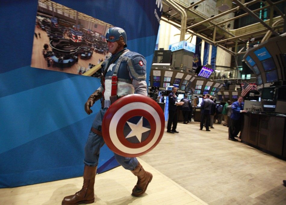 An actor dressed as comic book character Captain America walks on the floor of the New York Stock Exchange