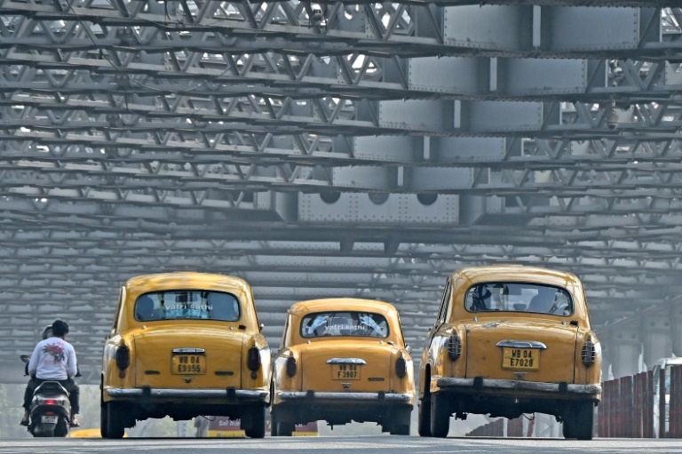 https://d.ibtimes.com/en/full/4583114/kolkatas-fleet-snub-nosed-yellow-taxis-are-readily-recognisable-symbol-citys-identity.jpg