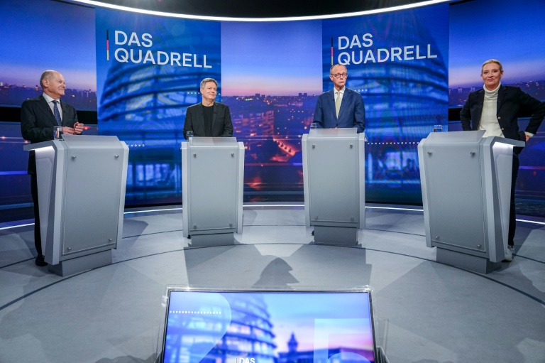 https://d.ibtimes.com/en/full/4583138/l-r-olaf-scholz-robert-habeck-friedrich-merz-alice-weidel-take-part-tv-debate-berlin.jpg