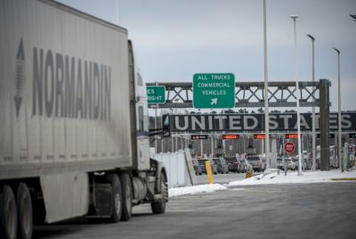 A truck prepares to enter the United States at a border crossing in Blackpool, Canada, a country which has vowed to hit back if Washington goes ahead with 25 percent tariffs on Canadian imports