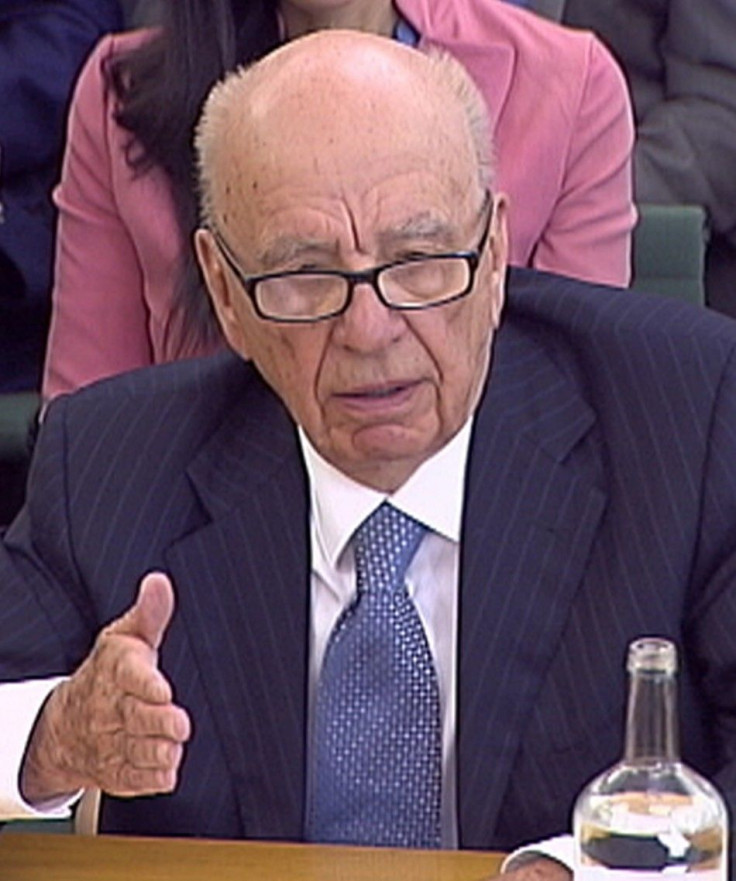 News Corp Chief Executive and Chairman Rupert Murdoch appears before a parliamentary committee on phone hacking at Portcullis House in London