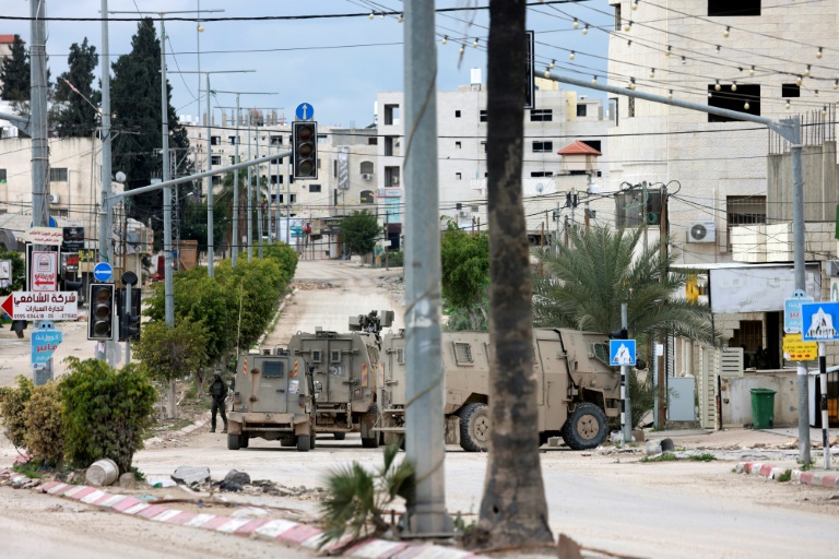 https://d.ibtimes.com/en/full/4584523/israeli-troops-entrance-occupied-west-bank-refugee-camp-tulkarem.jpg