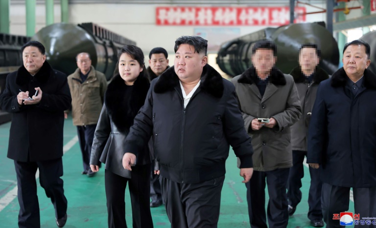 https://d.ibtimes.com/en/full/4585772/kim-jong-un-inspects-missile-launcher-production-facility.jpg