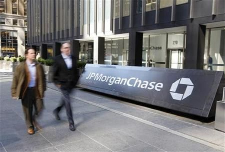 People walk past the JPMorgan Chase & Co building in New York