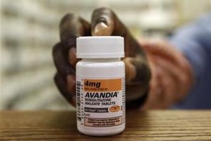 A pharmacist holds a bottle of Avandia in a store in Falls Church, Virginia