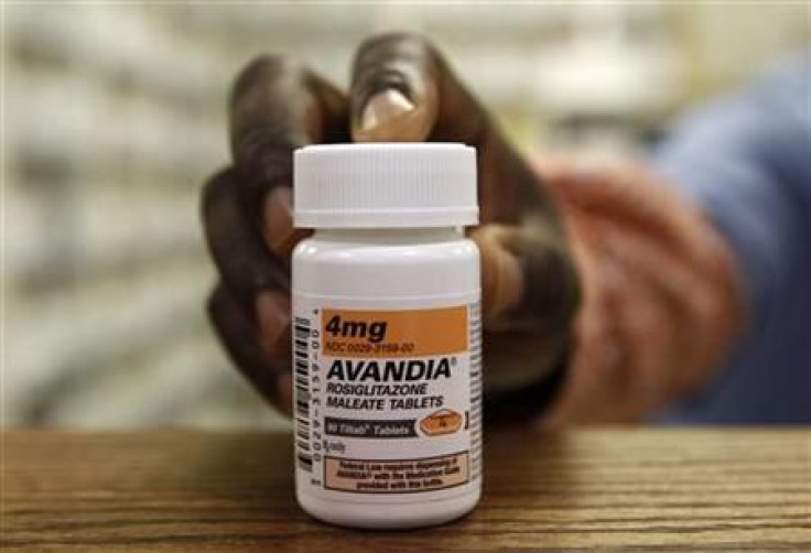 A pharmacist holds a bottle of Avandia in a store in Falls Church, Virginia