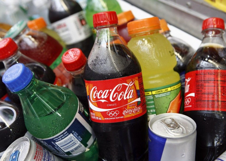 A Coca-Cola bottle is seen with other beverages in New York