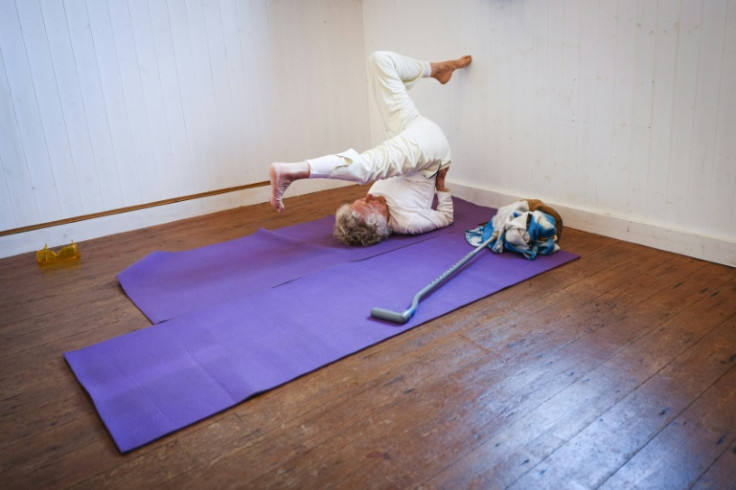 The war veteran celebrated her 100th birthday in October but still teaches yoga to a class of students