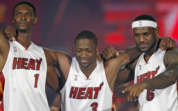 Bosh, Wade and James stand together at the 'HEAT Summer of 2010 Welcome Event' at the American Airlines Arena in Miami