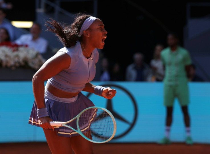 Coco Gauff celebrates after defeating Iga Swiatek at the Caja Magica in Madrid