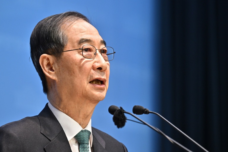 https://d.ibtimes.com/en/full/4598216/han-duck-soo-became-acting-president-after-yoon-suk-yeols-impeachment.jpg