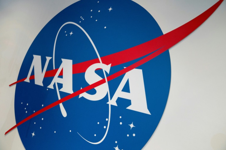 The NASA logo is displayed at the Earth Information Center exhibit