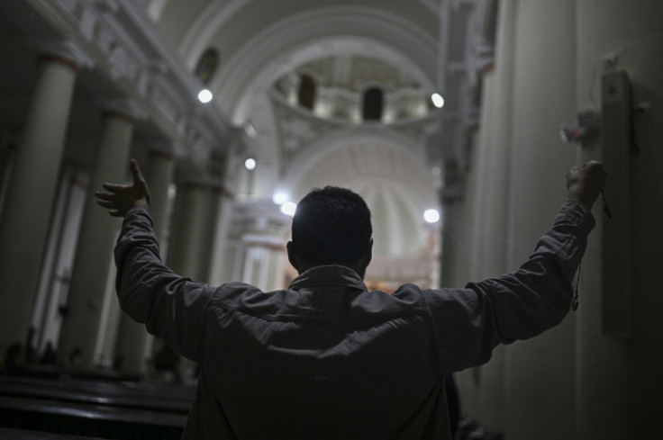A man prays at the Chiclayo's cathedral, northern Peru on May 8, 2025. US-born pontiff Leo XIV, close to Pope Francis, became a Peruvian national in 2015 and devoted more than 20 years as a missionary in the Andean country.