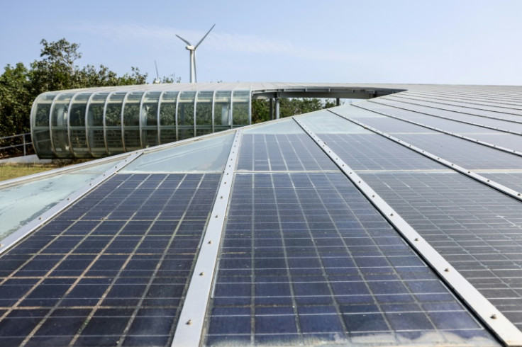 Solar has faced opposition from communities worried about panels occupying valuable land, while rules requiring locally made parts in wind turbines have slowed their deployment
