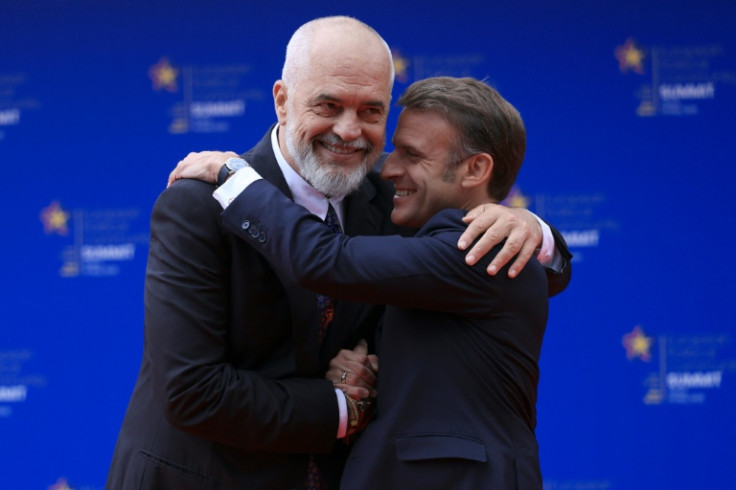 When French President Emmanuel Macron arrived, Rama quipped: 'Here's the Sun King' as the clouds parted