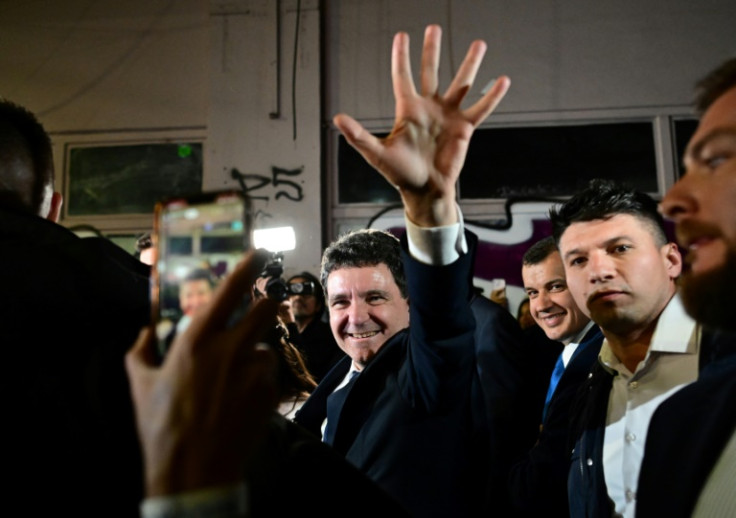 Dan (C) won almost 54 percent in the second round of Romania's presidential election