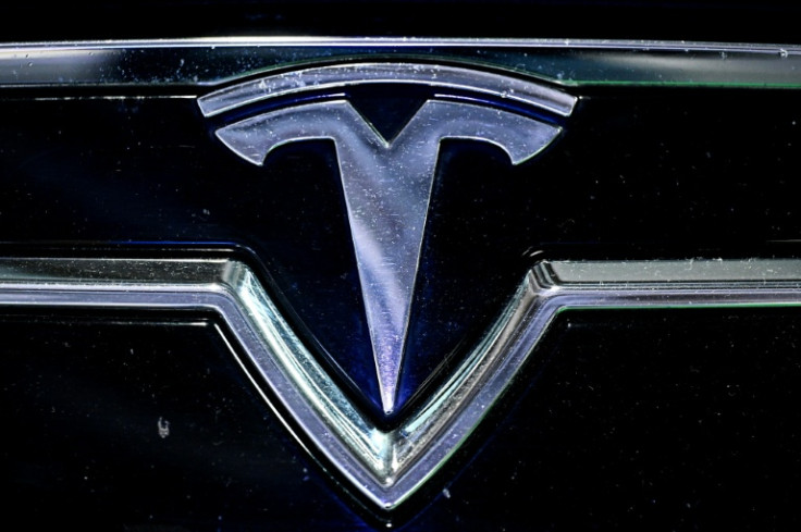 The logo of US company Tesla displayed at the Paris Motor Show at Paris Expo Porte de Versailles in Paris on October 16, 2024