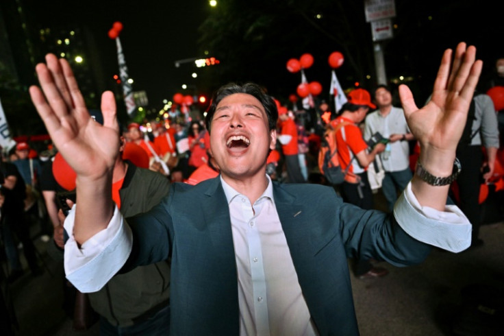 A man reacts as supporters of South Korean presidential candidate Kim Moon Soo of the People Power Party gather ahead of a televised presidential debate for the forthcoming June 3 presidential election outside the MBC media center in Seoul on May 27, 2025