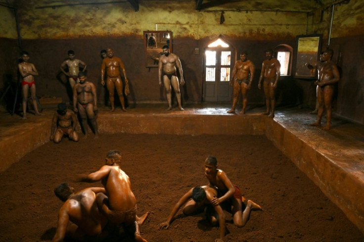 Unlike conventional wrestling matches played on mats with regulated draws, India's "mud wrestling" is more raw