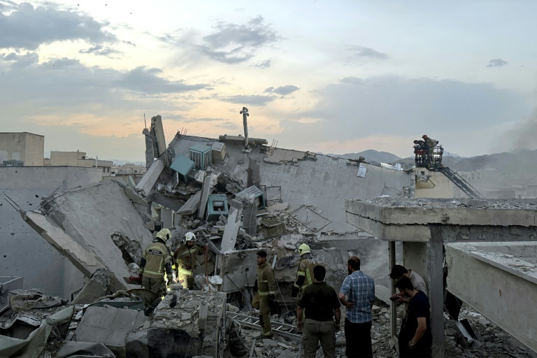 https://d.ibtimes.com/en/full/4604512/buildings-tehran-were-hit-wave-israeli-strikes-across-iran.jpg