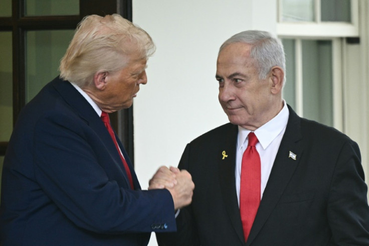 US President Donald Trump shakes hands with Israeli Prime Minister Benjamin Netanyahu as Netanyahu departs the White House in Washington, DC, in April 2025