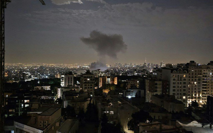 A photo by Iran's Revolutionary Guard Corps (IRGC) official Sepah News Telegram channel on June 13, 2025 shows smoke billowing from a site reportedly targeted by an Israeli strike in the Iranian capital Tehran