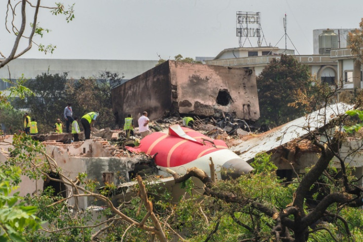 There was one survivor out of 242 passengers and crew on board the jet when it crashed, leaving the tailpiece of the aircraft jutting out of a hostel for medical staff