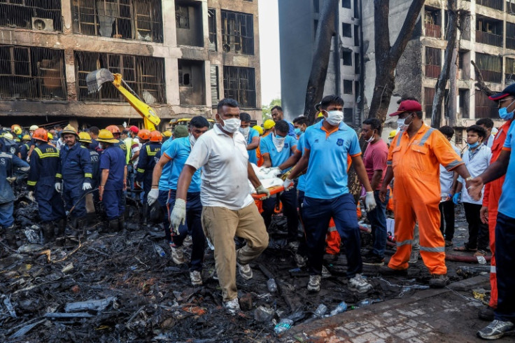 At least 24 people were killed on the ground in Ahmedabad