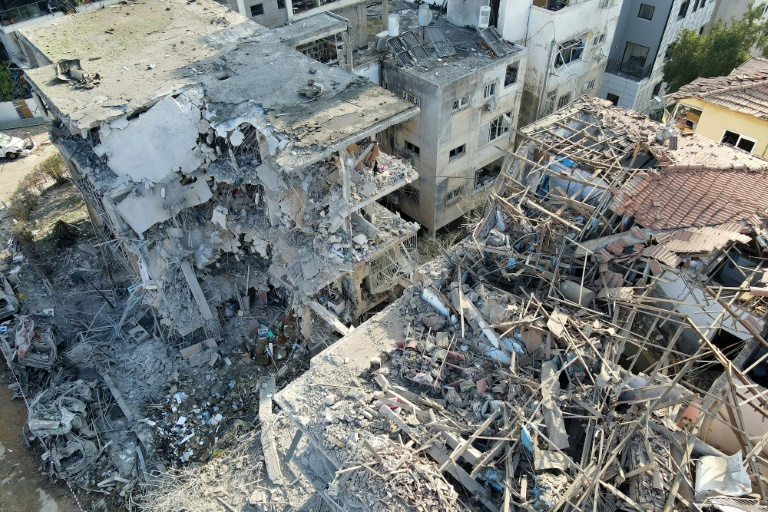 https://d.ibtimes.com/en/full/4604991/iran-hit-israel-waves-drone-missile-strikes-overnight.jpg