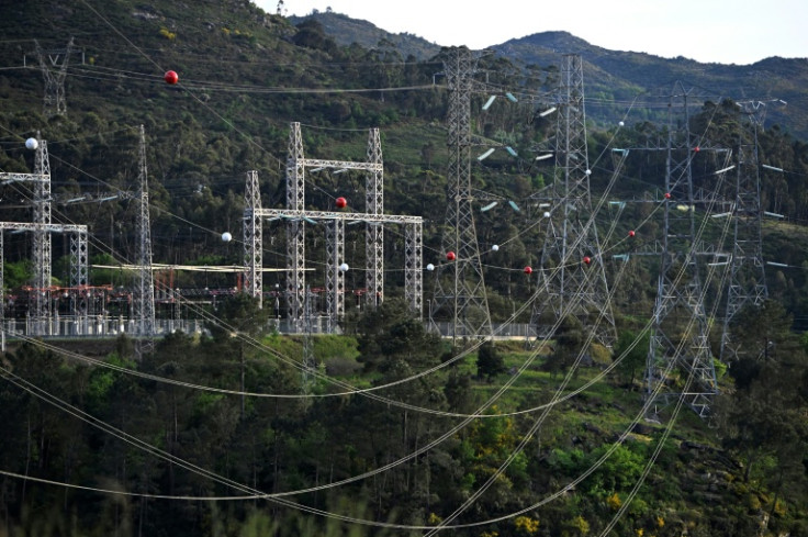 High-voltage transmission towers carrying electricity from Spain to Portugal are pictured near the border, in Lindoso, Portugal, on April 28, 2025