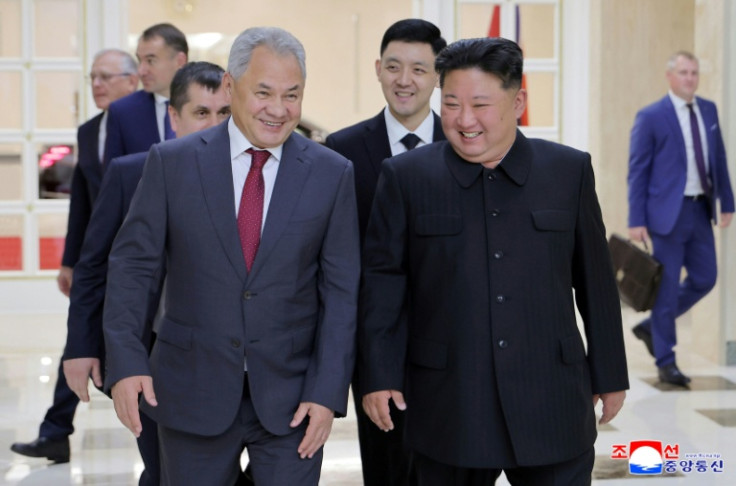 Russian security chief Sergei Shoigu (L) and North Korean leader Kim Jong Un (R) met on the one-year anniversary of the sweeping military pact between their two countries