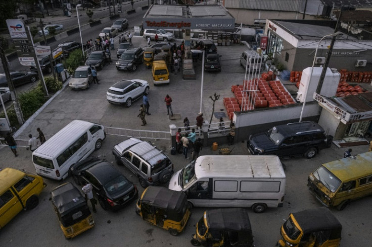 Motorists have faced queues for petrol whose price has shot up after the scrapping of subsidies