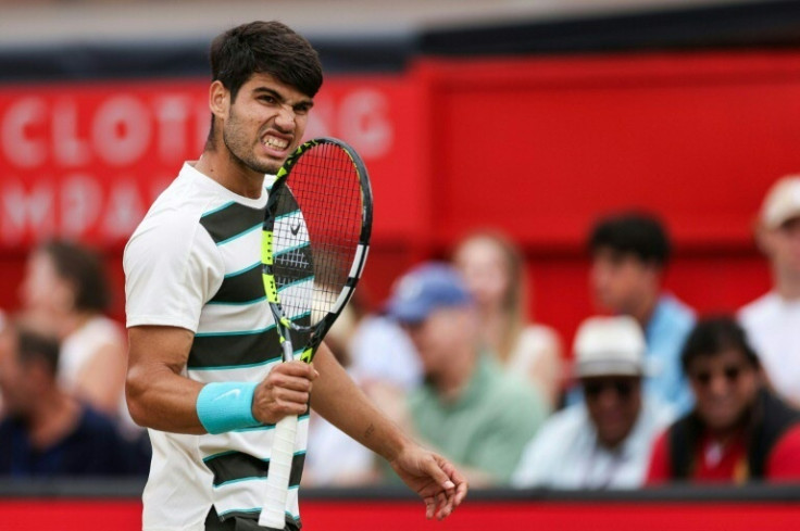 Spain's Carlos Alcaraz celebrates winning the Queen's Club title for a second time