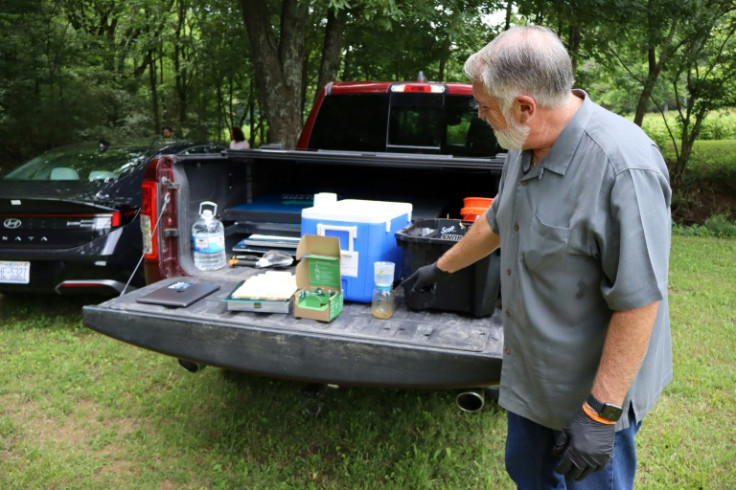Civil engineer and water quality expert Bob Bowcock conducts a test for forever chemicals