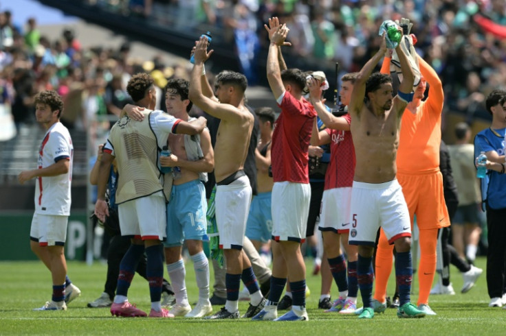 PSG's players celebrate their team's victory over Seattle as they reached the Club World Cup last 16 on Monday