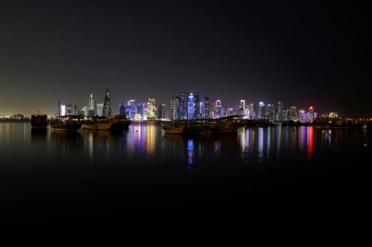 Traditional boats anchored in front of Doha's buildings, in Qatar, on June 23, 2025. Iran announced it had launched missiles at a major US base in Qatar on June 23 in retaliation for American strikes on key nuclear facilities, with explosions ringing out