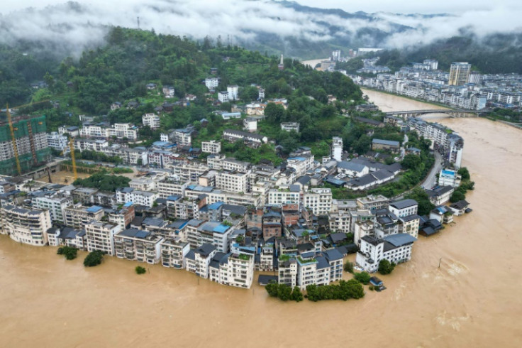 China is enduring a summer of extreme weather, with heat waves scorching wide swaths of the country while rainstorms pummel other regions