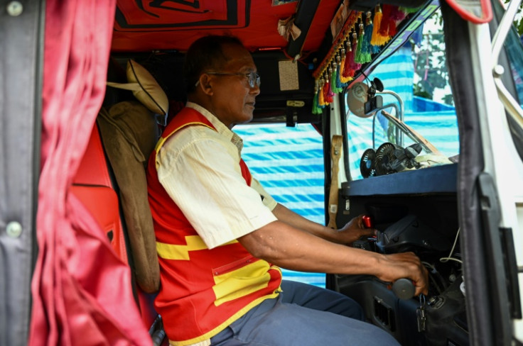 Tuk-tuk driver San Noeun drives in Poipet, the usually bustling border crossing between Thailand and Cambodia