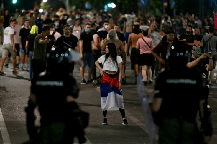 Tens of thousands of protesters faced off against police in the latest protest against Serbia's President Aleksandar Vucic