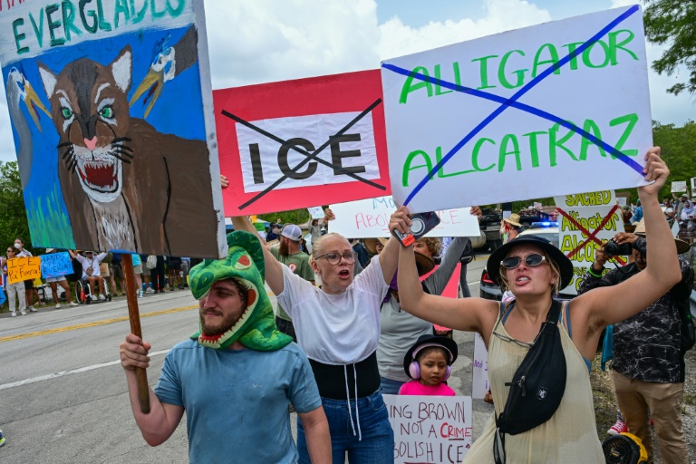 https://d.ibtimes.com/en/full/4608284/demonstrators-protest-construction-immigrant-detention-center-dubbed-alligator-alcatraz.jpg